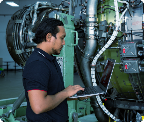 Aviation technician servicing aircraft components in a component workshop, highlighting ADE’s repair, inspection, and maintenance capabilities